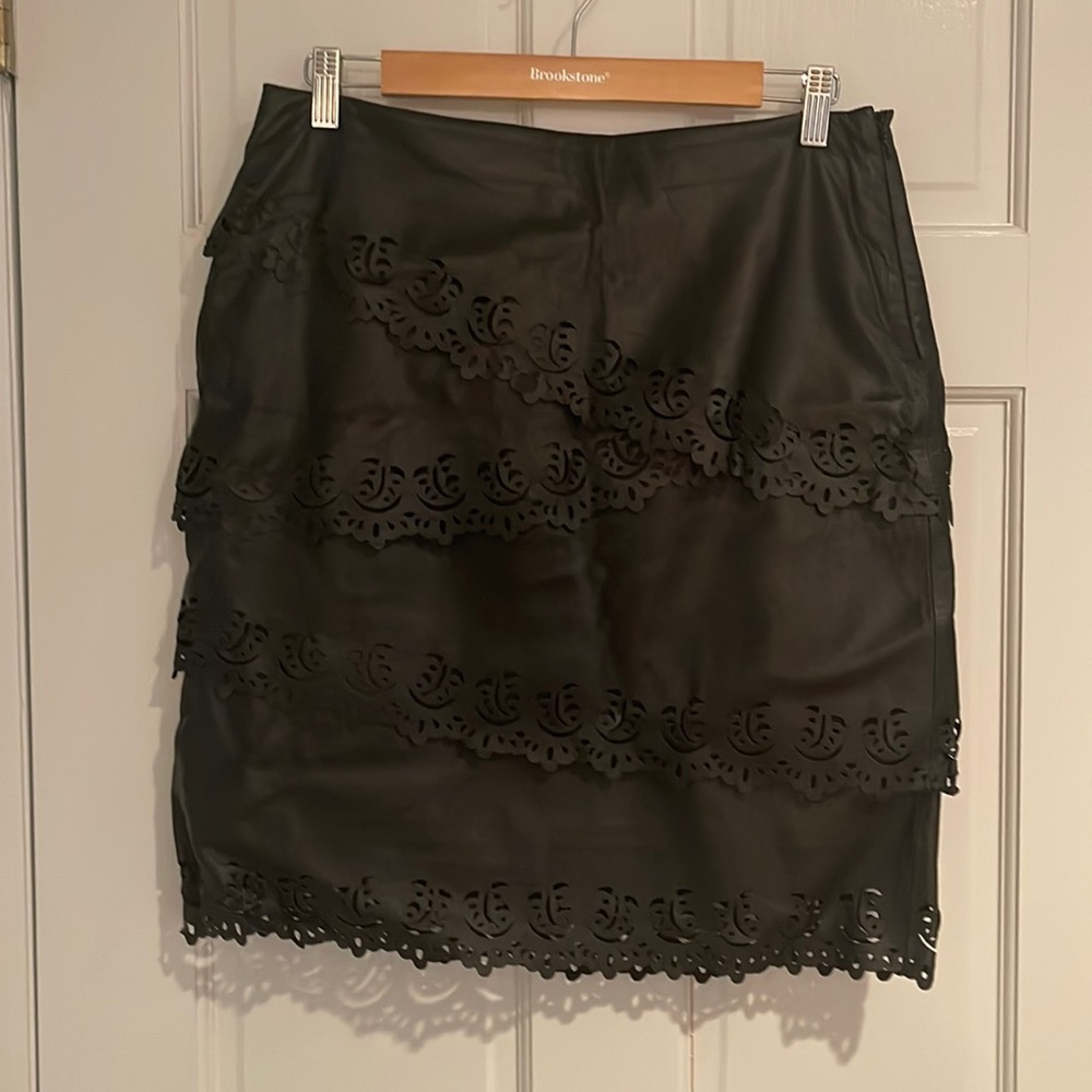 Laser cut leather skirt, fully lined with side zipper